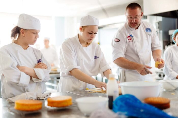hull college catering lecturer and students in class