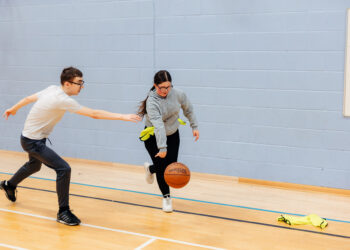 sports students playing basketball at hull college