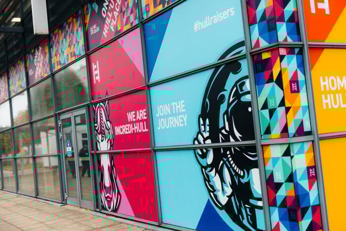 hull college campus with join the journey messaging