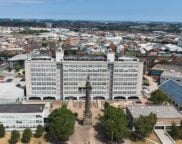 drone shot of the hull college campus with tower block and wilberforce statue