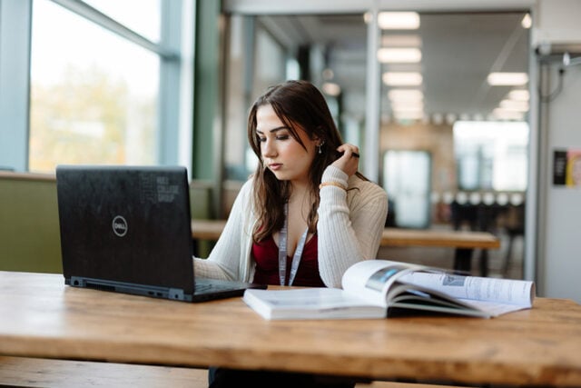 student studying in elevate